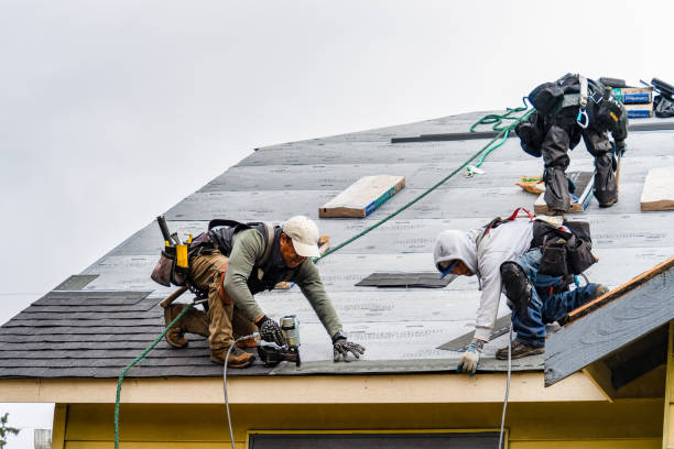Professional Gutter Installation technician working in Walker, MI